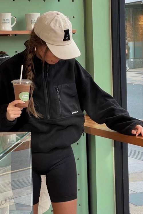 24 Soccer Mom Outfits That Make You the Hottest on the Sidelines 9 9. half zip sweatshirt cycling shorts